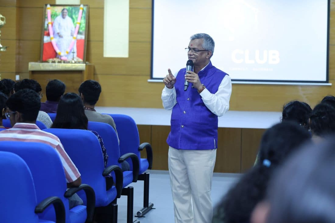 A guest speaker addressing students at an IoT Club session